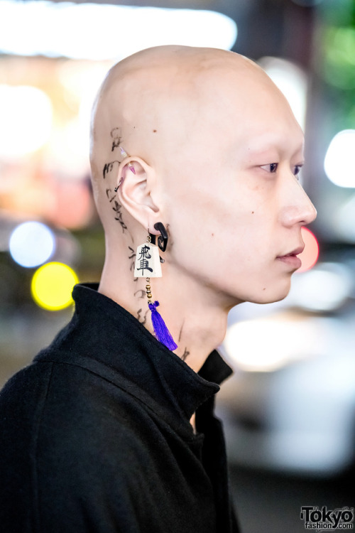 tokyo-fashion: Japanese musician and model Shouta on the street in Harajuku at night wearing Yohji Y