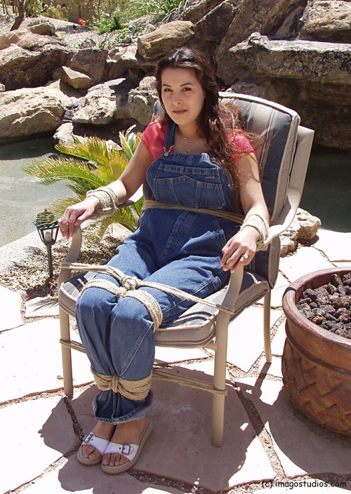 nowheretohide14:  graybandanna:  If you have to be bound, gagged and blindfolded, sitting out on the patio in the sun is a lot nicer than a cold, dark dungeon  I love this. More outdoor photos. 