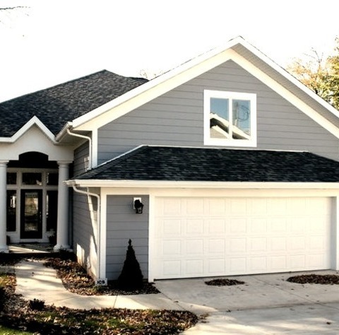 Exterior Fiberboard In ChicagoIdea For A Medium-sized, Modern, Gray, Three-story Concrete Home Exterior