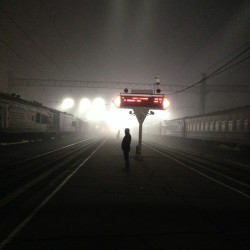 natgeotravel:  Dramatic lighting creates a silhouette of a lone traveler at the central train station in Irkutsk, Russia. See this photo of the transsiberian rail and more stunning travel photos » Photograph by Romain Poirot-Lellig