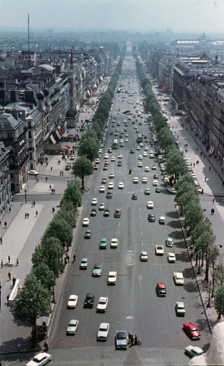 scavengedluxury:   View of the Arc de Triomphe, Avenue des Champs-Élysées, Paris, 1963.  From the Budapest Municipal Photography Company archive.