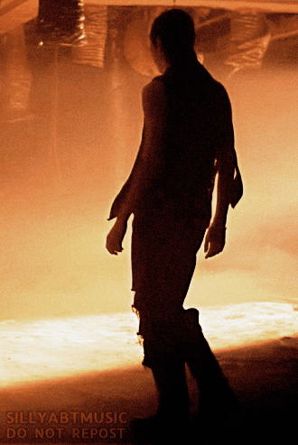 A silhouette of Dongmyeong walking away from the camera