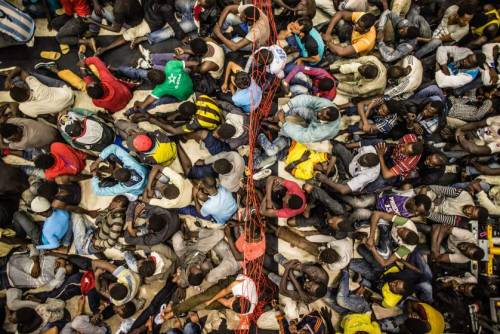 fooleyes:Boat Migrants Risk Everything for a New Life in EuropePhotographer Massimo Sestini accompan