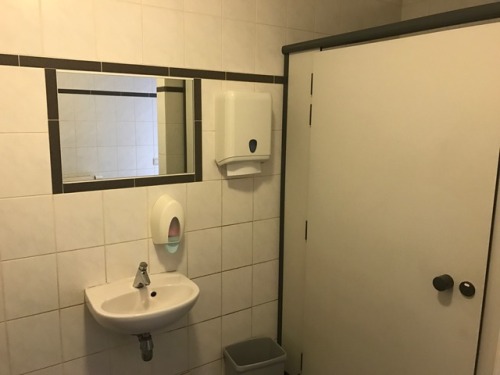 A shared restroom from a pub and event hall. Lebbeke market square