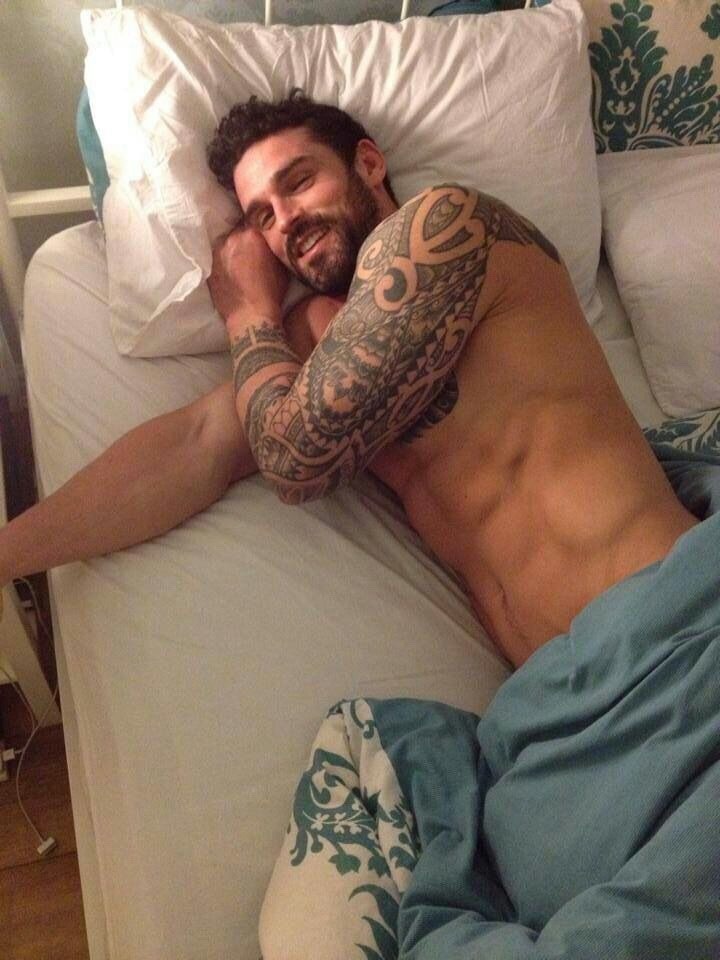 Men with beards tattoos and muscles