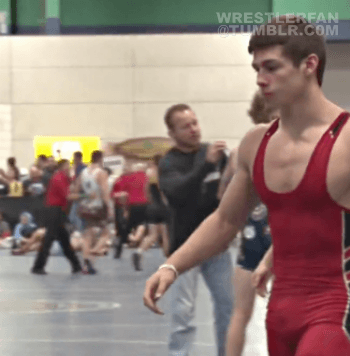 just-andrews-blog:This is one very hot wrestler and so sexy in his tight red singlet showing off his
