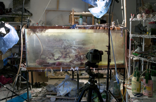 likeafieldmouse: Kim Keever “Miniature topographies inside 200-gallon fish tanks, based on traditional landscape paintings. Keever fills the tanks with water once he’s sculpted and placed the miniatures, and colored lights and pigments create dense,