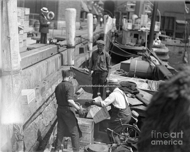 Rum runners (bootleggers) at a pier, 1924. Photo:... - New York: The ...