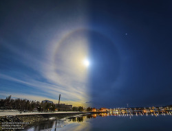 sci-universe:I think this is one of the most creative day and night composites. It combines two pictures captured on April 1, separated in time by about 10 hours to show the halos of both Sun and Moon! They really do align, each with an angular radius