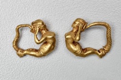theancientwayoflife:~ Pair of earrings with female figure. Culture: Greek Date: late 4th century B.C. Medium: Gold