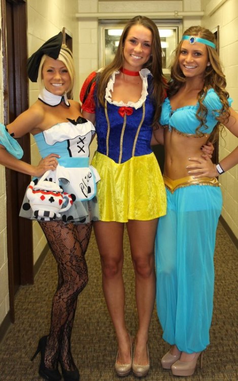 halloweenisforthesexy: You know this sexy Halloween threesome stopped traffic in the dorm halls that