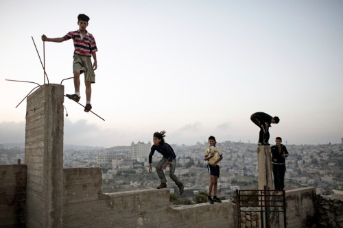 benadrylpapi:  ISRAEL. Palestine. 2007. Boys playing on a hill overlooking Bethlehem. Christopher An