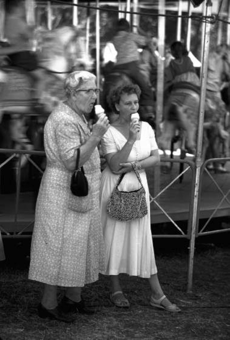 joeinct: Two women enjoying ice cream cones at the Iowa State Fair, Photo by John