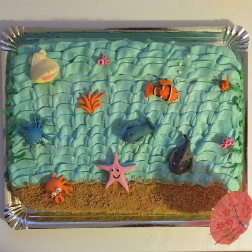 Inés&rsquo; birthday cake. Cake and blue icing for sea and cookie crumbles for sand by my aunt Esthe