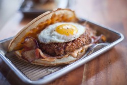 food-porn-diary:  Chicken and waffle sandwich with bacon, cheddar, sriracha mayo, and a sunny side egg [OC][3369x2246]