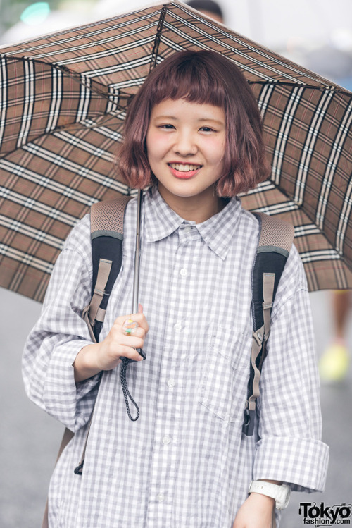 21-year-old Ayami on the street in Harajuku wearing a vintage checkered shirt with fried egg denim p