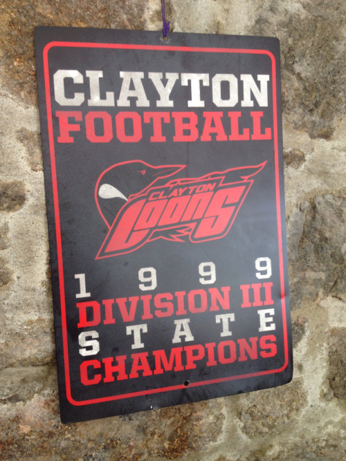 Clayton High School football team. Living, it appears, off the scraps of past glories!Signage design