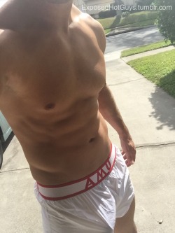 exposedhotguys:  My friends at AlphaMaleUndies.com sent me a pair of their nylon shorts promising me they’d be see-thru when wet. So I did a little test today in the front yard for all my neighbors to see. Check out their website AlphaMaleUndies.com