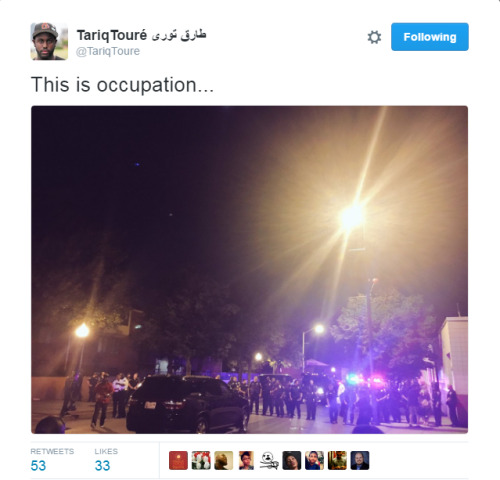 mrbowtiefly:  tfry1440:  ultra13:  lagonegirl:  You gonna #FreddieGray us?    Heavy police presence as Baltimore residents grieve for slain rapper     A heavy police presence accompanied dozens of fans of rapper Lor Scoota as they took to the streets