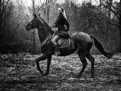 Allison Lancaster riding her horse in the rain. Captured by Adrian Nina.