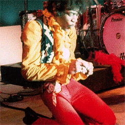 clarabows:  Jimi Hendrix setting his guitar on fire, Monterey Pop Festival, 1967. 