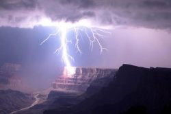 sixpenceee:    This incredible photo of a lightning strike at the South Rim of the Grand Canyon was shot by photographer and videographer Travis Roe in July of 2012. (Source)  
