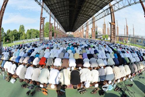 yahoonews:  Photos of the day - July 28, 2014 An Indonesian Muslim offers Eid al-Fitr prayers marking the end of the holy fasting month of Ramadan in Jakarta, a fisherman is silhouetted against the lit skyline of Wonsan, North Korea and Washington Redskin