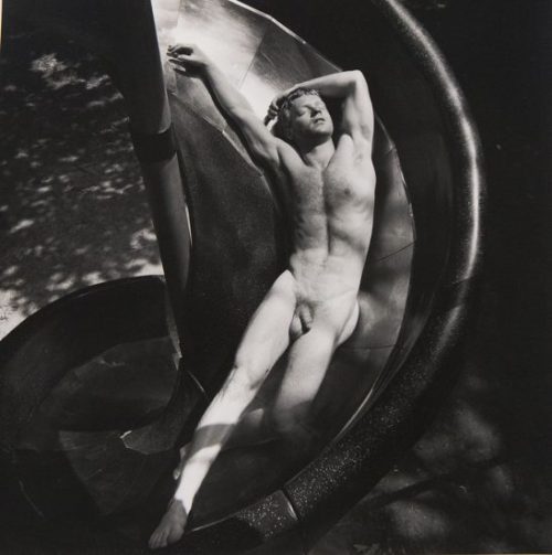 Kent on Slide by Arthur Tress, 1979.Falling asleep: the concept is almost violent. A fall is an unco