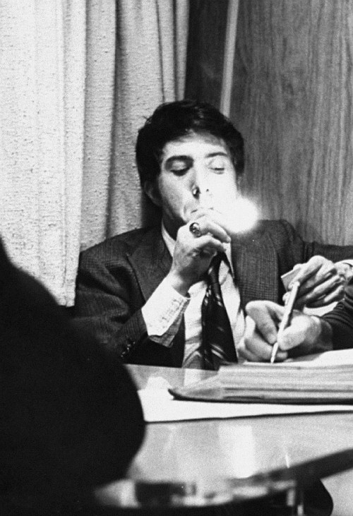  Dustin Hoffman photographed by John Dominis lighting a cigarette on the set of John and Mary, 1969.   
