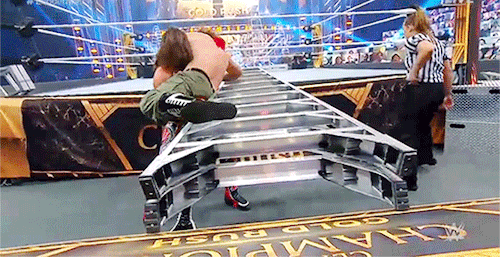 mith-gifs-wrestling: I always enjoy those tiny moments when you can catch wrestlers adjusting thing