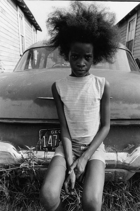 kvetchlandia:  Paul Kiwlecki     Girl Sitting on the Bumper of an Old Car, Georgia