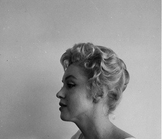 :  Marilyn Monroe photographed in 1956 © Milton Greene.   Cutie