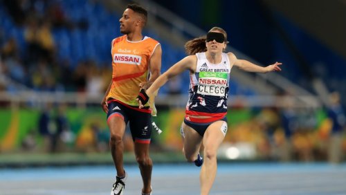 Libby Clegg and guide Chris Clarke win gold in the T11 100m