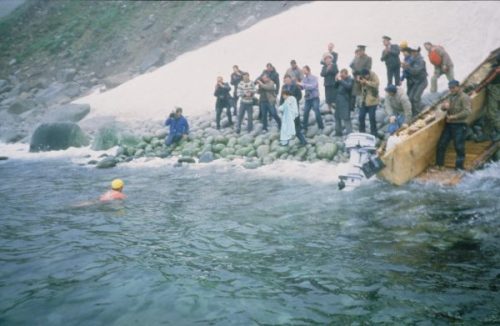 Endurance swimmer Lynne Cox approaches a snowy beach on Big DiomedeIsland, after becoming the first 