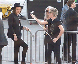 harryslimane:  harryslimane:  Harry refusing a selfie to a bored Niall (x)   NOBODY refuses a selfie