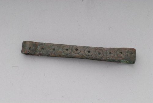 Copper alloy tweezers (Anglo-Saxon, 500s), found in Barham (Suffolk,England).  They are decorated on