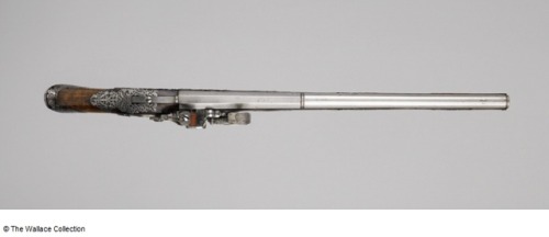 An ornate pair of silver mounted snaphaunce pistols crafted by Antonio Venazolo of Brescia, Italy, c