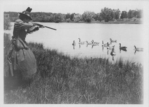 hclib: First Woman Member of the Minneapolis Gun Club Nettie Shattuck aims at geese on Lake of the I
