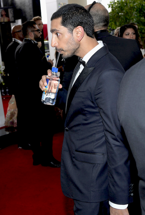 Riz Ahmed at the 74th annual Golden Globe Awards sponsored by FIJI Water at The Beverly Hilton Hotel