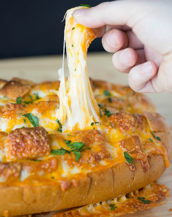 appledress:  firiona:  gastrogirl:  cheesy pull-apart bread.  Dear all: this was what I made tonight. It was very satisfying. (Only use half the cheese. It sill still be plenty.)  this is the greatest thing ever  IT WAS SO GOOD BUT I DON&rsquo;T THINK