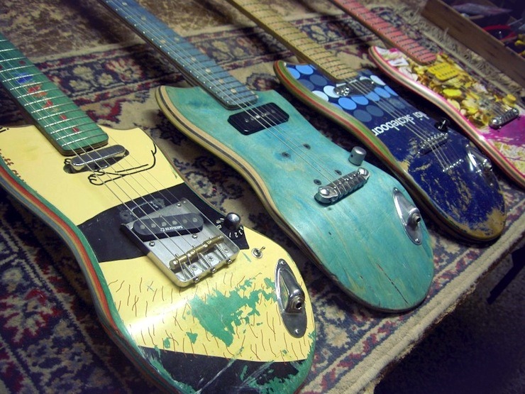 gaksdesigns:  Guitars made from recycled skateboards.  