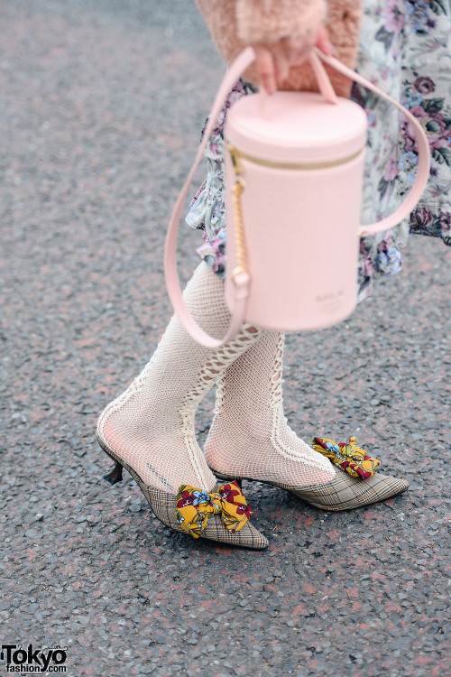 Tokyo street style personality Alice on the street in Harajuku wearing a retro inspired look with a 