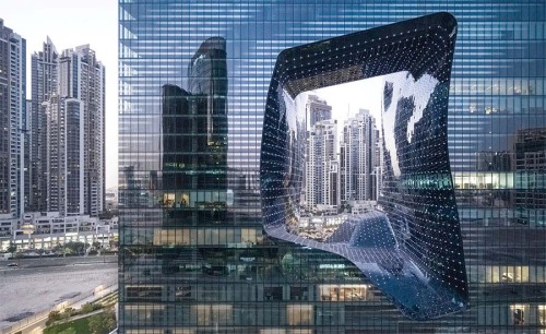 The Opus by Omniyat Illuminates Dubai’s Burj KalifaDistrict Conceived by Zaha Hadid in 2007, the Opu