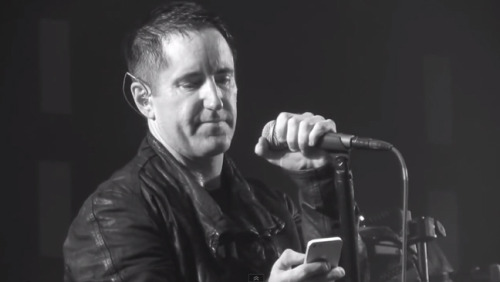 the-prettiest-hate-machine:  iforgothowtonormal:  Trent Reznor FaceTimes a fan live on stage, who was diagnosed with cancer and had a few weeks left to live. “As your time is running out, let me take away your doubt. We can find a better place in