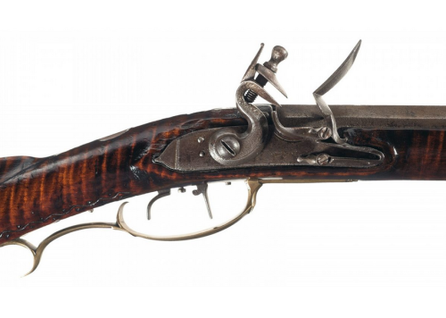 Incredible flintlock Pennsylvania Long Rifle crafted by Peter Gonter of Lancaster, PA, 18th century.
