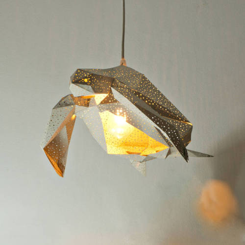 sosuperawesome:Fully Assembled and DIY Paper Craft Lamps by Vasili Lights on EtsySee our ‘lighting’ 