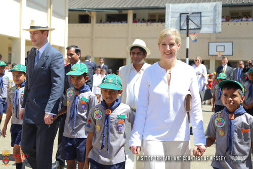 Their Royal Highnesses The Earl and Countess of Wessex walking with children during s visit to Trini