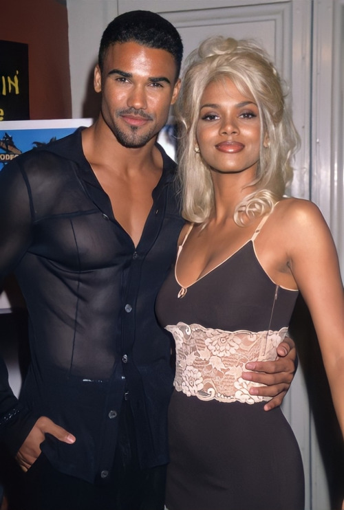 flyandfamousblackgirls:  Halle Berry with Shemar Moore at the premiere of “B*A*P*S” (199