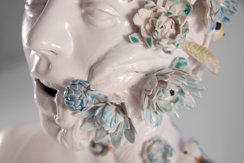 idreamofaworldofcouture:Ceramic busts overgrown with twisted vines and colourful flowers by Jess Riv