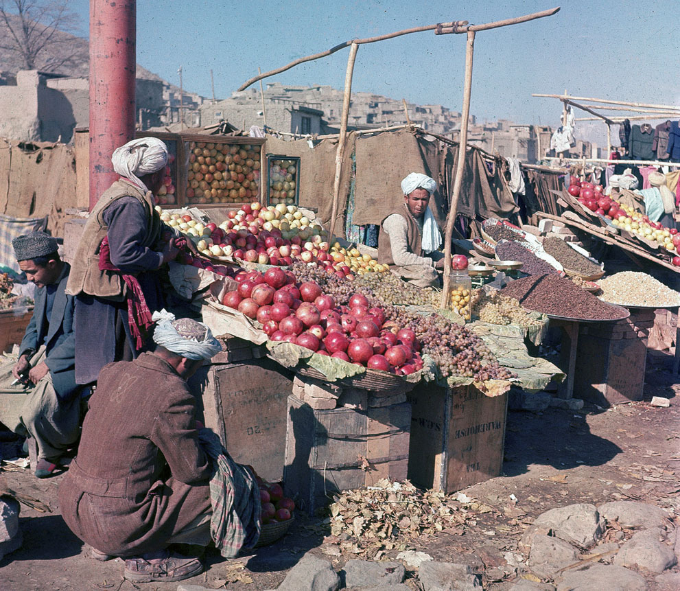 brassmanticore:  Vendors sell various fruits and nuts at an outdoor market in Kabul,